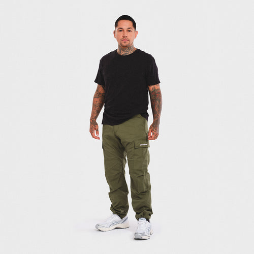 man model tattoo smith street brooklyn new york city cargo pants cargos damiano clothing luxury streetwear asics carhartt fashion style