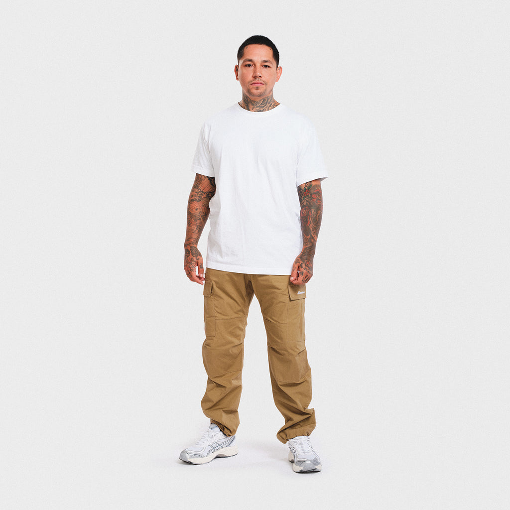 man tattoos model smith street brooklyn new york city cargo pants damiano clothing high quality luxury streetwear asics carhartt