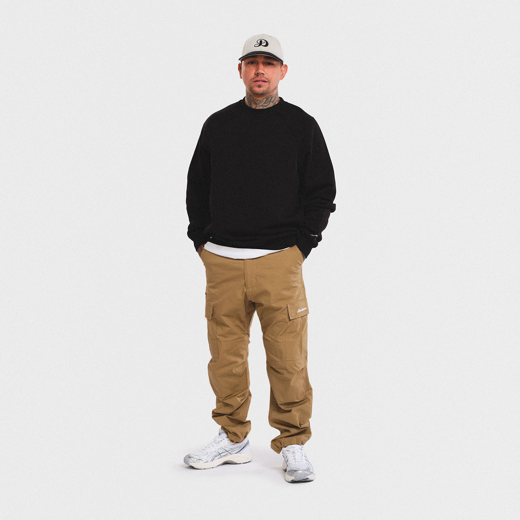 man tattoos model smith street brooklyn new york city cargo pants damiano clothing high quality luxury streetwear asics carhartt