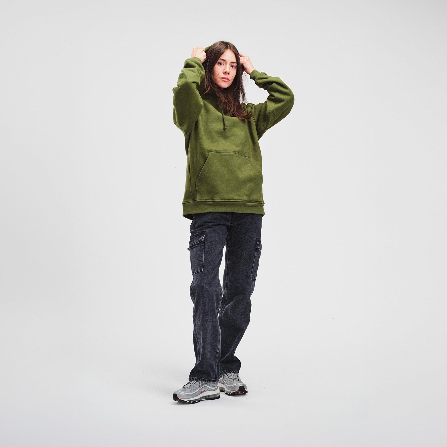 woman model thin tattoos forest green hoodie nike air max 97 high quality luxury streetwear new york city nyc damiano clothing