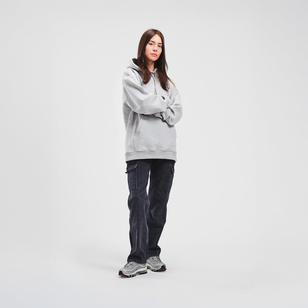 woman model thin tattoos gray hoodie nike air max 97 high quality luxury streetwear new york city nyc damiano clothing