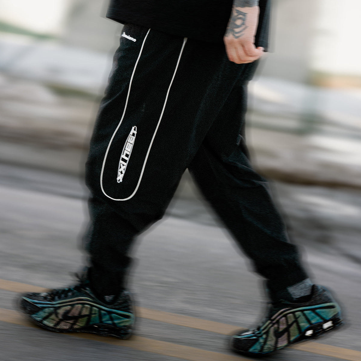 man model tattoos black track pants reflective streetwear hip hop hardcore damiano clothing xxl heat 1000words forever nike