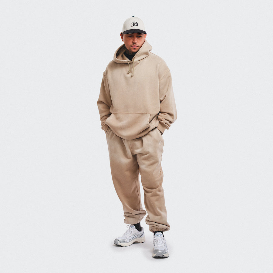 Putty light gray bone white black baseball cap hat SnapBack Damiano embroidered logo high quality clothing luxury streetwear New York City man model tattoos hoodie sweatpants sweats cotton