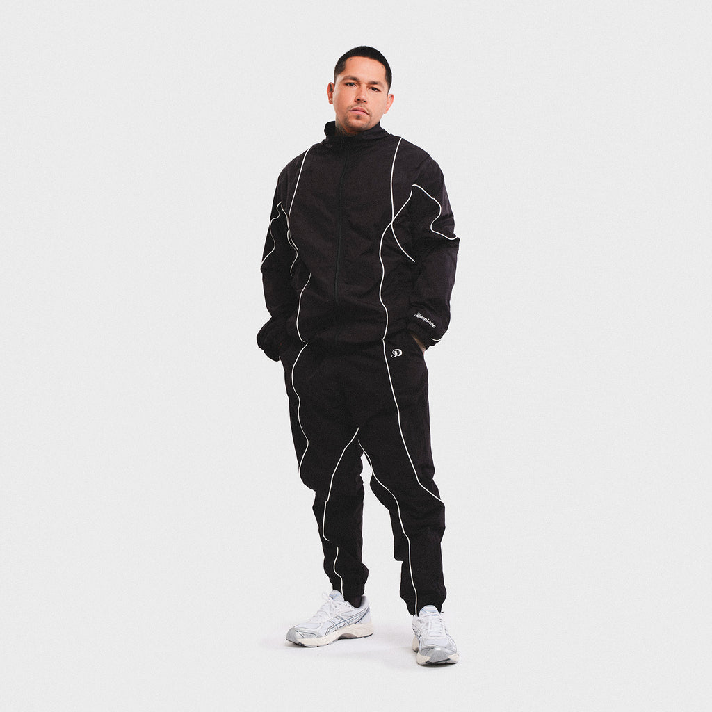 man model tattoo smith street brooklyn new york city asics streetwear luxury high quality track pant 3m reflective