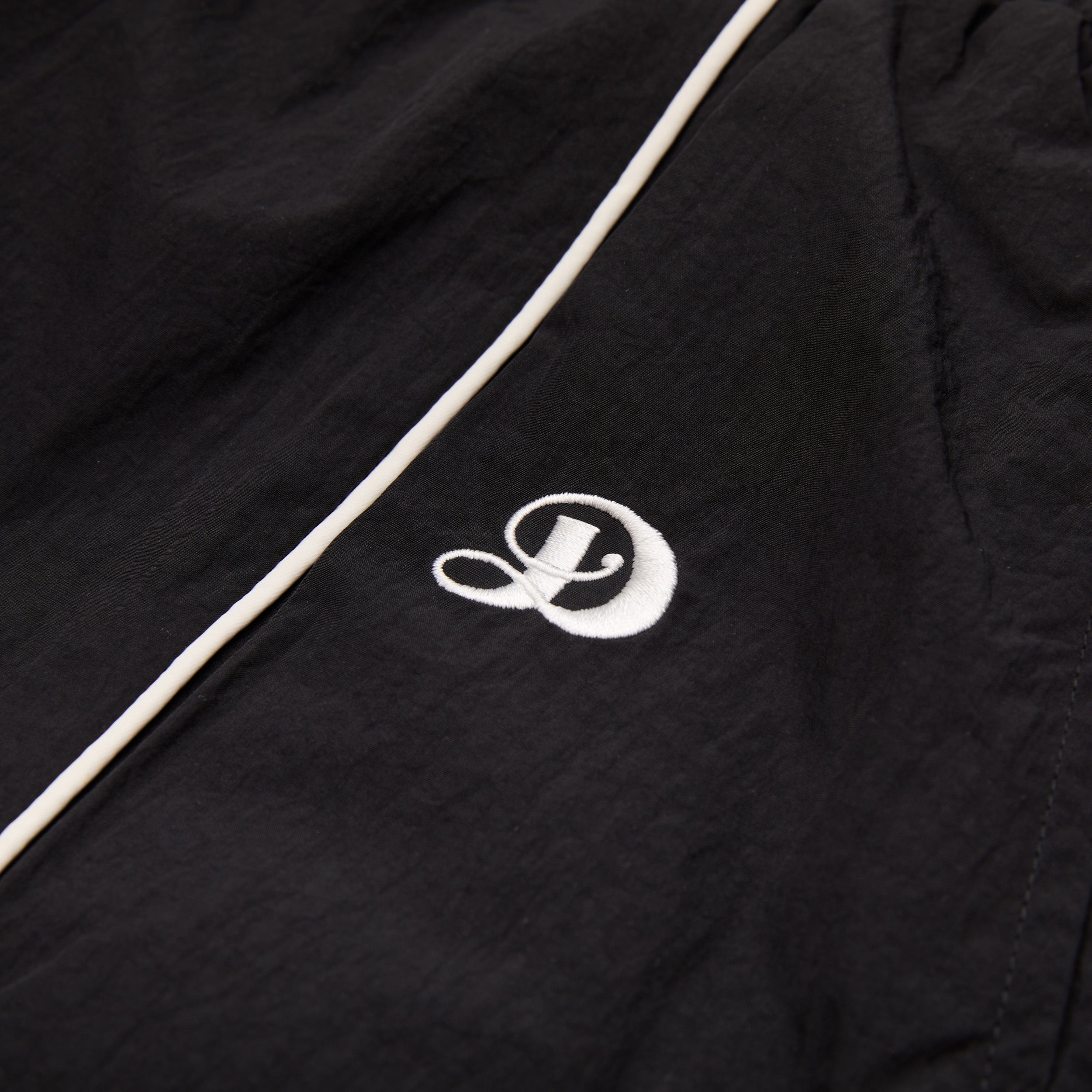 black track jacket pant suit 3m reflective embroidered logo activewear new york city damiano clothing luxury streetwear