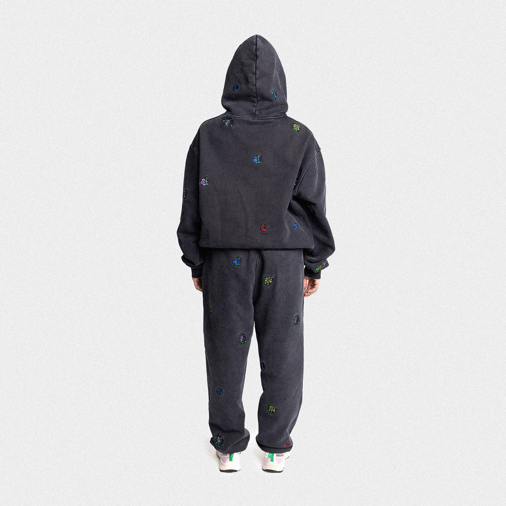 dark gray oversized baggy vintage wash sweatpants hoodie floral embroidery damiano clothing luxury streetwear high quality woman model